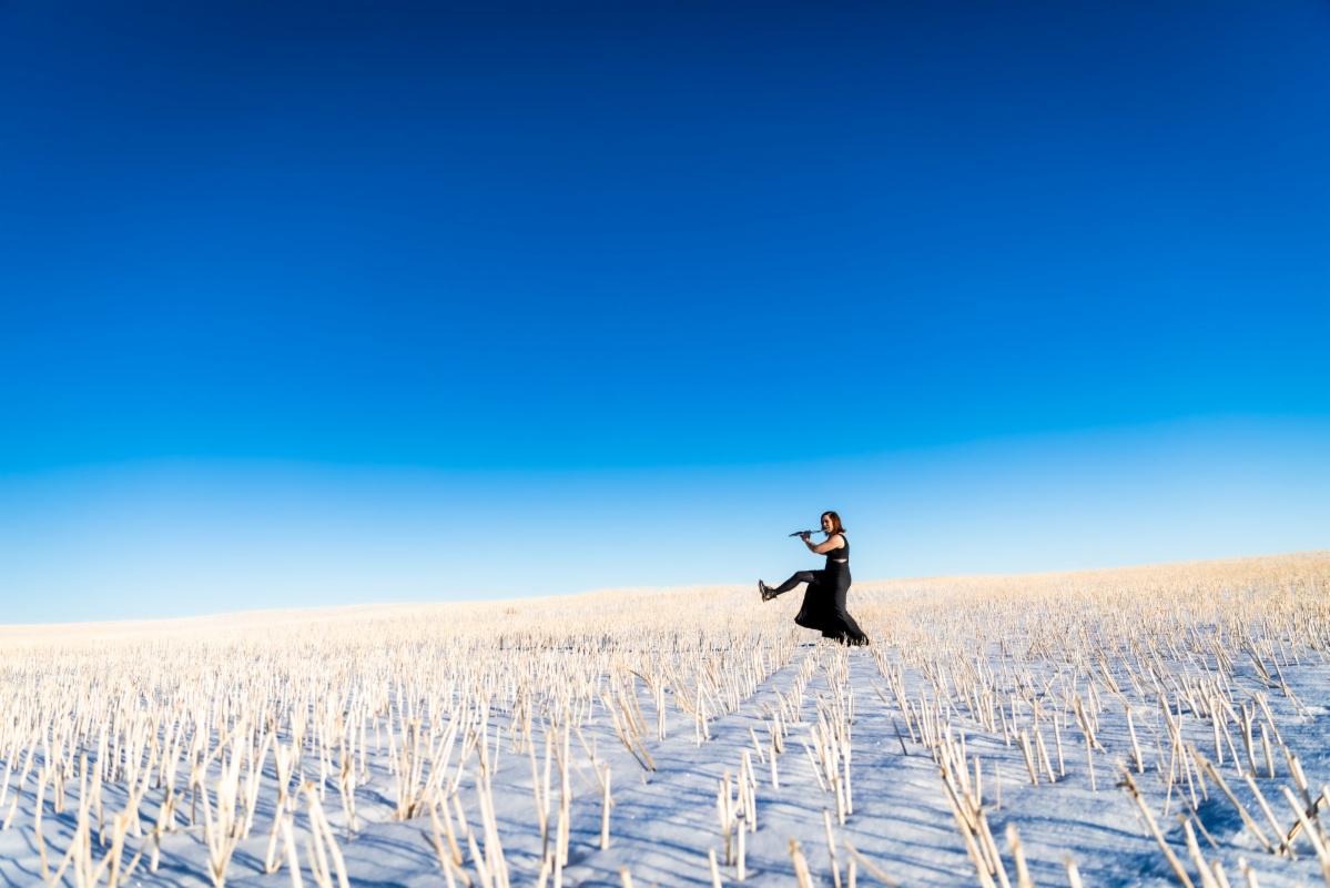 Flutist in the frozen plain (II) height=
