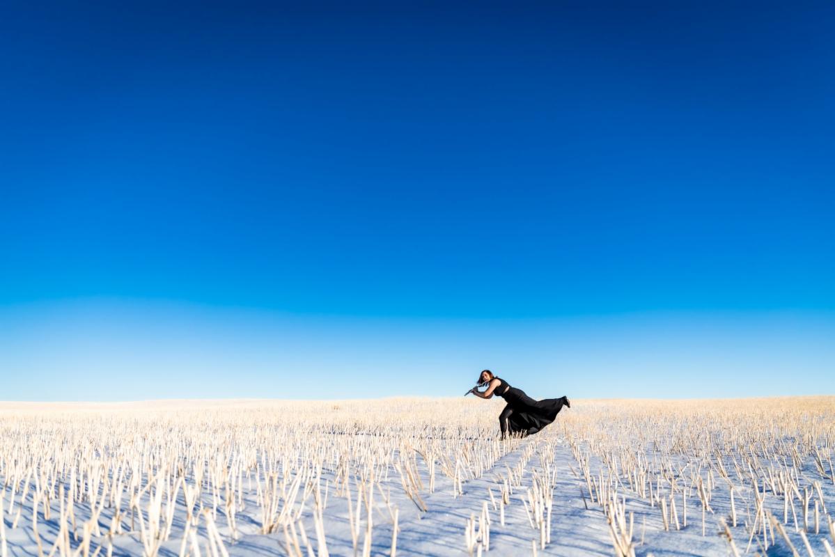 Flutist in the frozen plain (II) height=