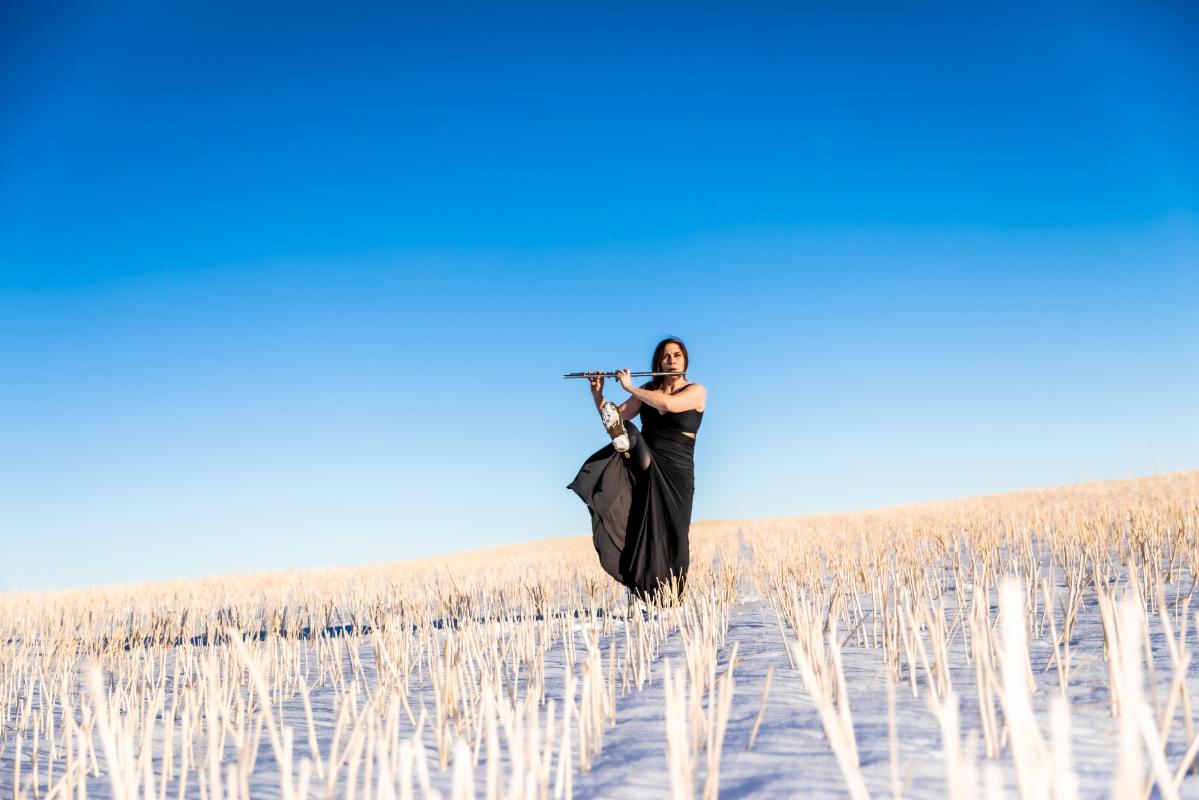 Flutist in the frozen plain (III) height=